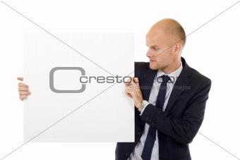 Businessman holding blank board