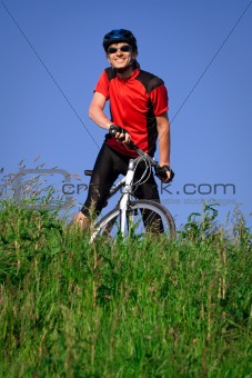 Young man with bicycle