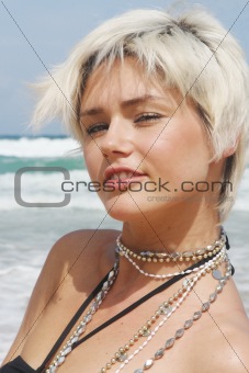 Blond woman at the beach.
