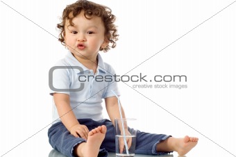 Child with glass of water.