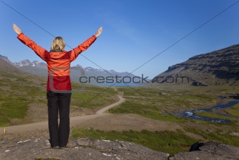Woman Hiker Looking Down The Berufjordur Valley Iceland
