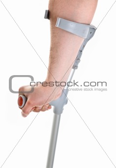 hand holding crutch