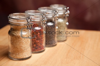 Glass Bottles of Various Cooking Spices
