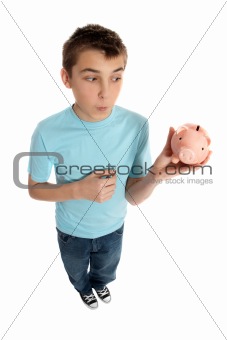 Boy looking at money box