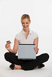 woman with credit card and computer