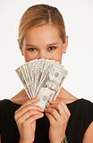 businesswoman holding up dollars