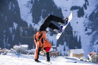 Break dance. Snowboarder, stunt. Tien Shan
