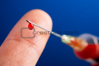 neelde with droplet of blood
