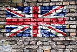 Flag of the United Kingdom on an old brick wall