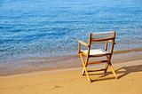 Chair on a golden sandy beach