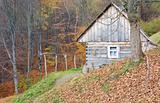 Small house on autumn mountains