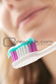 Brushing teeth.