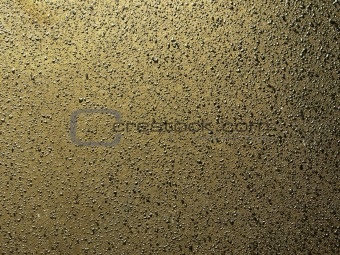 Metal plate with black drops
