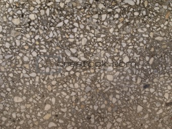 Concrete floor with stones