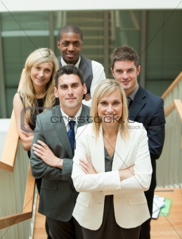 Businesspeople with a woman in the middle
