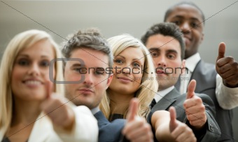 Business team with the thumbs up
