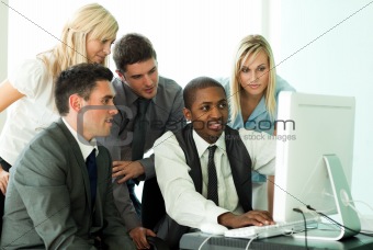 Ethnic business team working in office