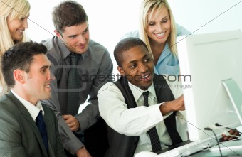 Afro-American manager explaining a job to his team