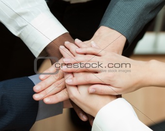 Close-up of hands together. Concept of union in business