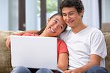 Young couple browsing internet at home