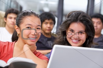 Two female student smiling to camera