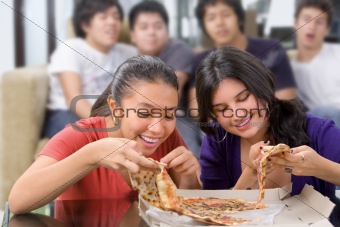 Girls got the first chance to eat pizza