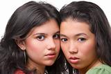 Two female teenager pose cool to camera 