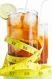 Two glass of soft drinks with tape measure