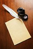 Old blank paper and quill pen