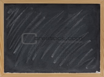 blank blackboard with chalk smudges