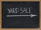 yard sale sign on blackboard