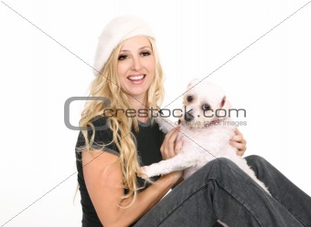 Female playing with a small dog