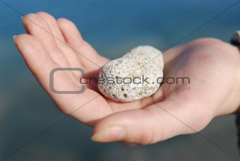 Hand with stone