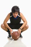 Basketball player bend on knee