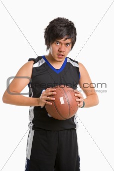 Basketball player holding ball