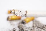 Burning cigarettes on ashtray