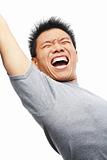 Asian man screaming to express his excitement