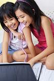 Little girls using laptop