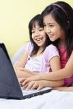 Little girls using laptop