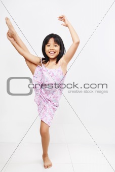 Little girl doing stretching