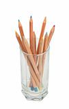 Set of multicolored wood pencils in glass.
