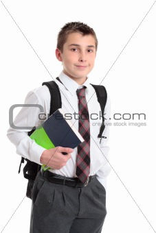 Schoolboy with books and backpack