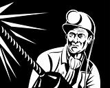 Coal miner working with pneumatic drill