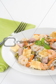 Plate of shrimp fried rice peas ham omelette
