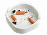 White ashtray with group a smoking butts.