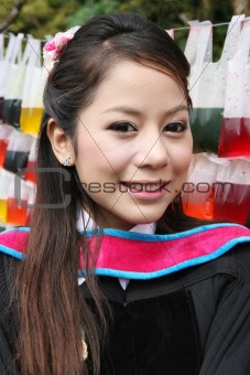 Asian graduate.
