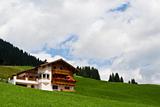 Traditional alpine chalet. Summer time