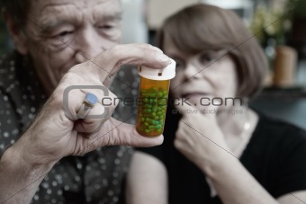 Senior Couple at Home with Perscription