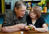Senior Couple at Home Discussing Medication