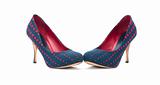 Pair of high-heeled blue and red shoes isolated on white